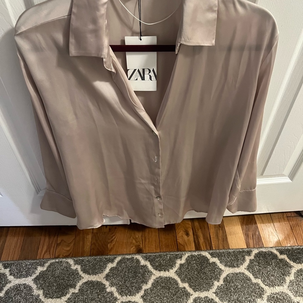 Zara new 100% polyester beige blouse size small.
